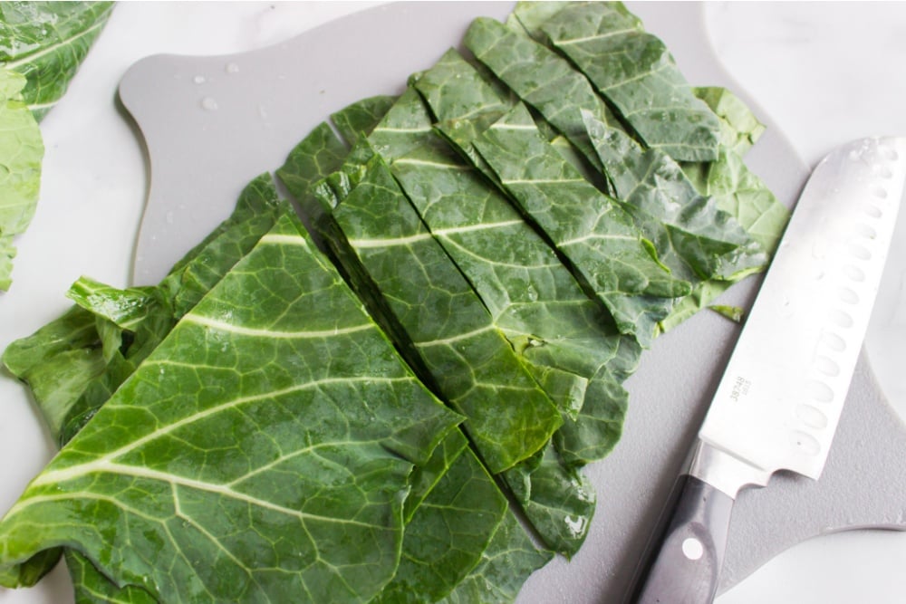 collard greens sliced on a cutting board