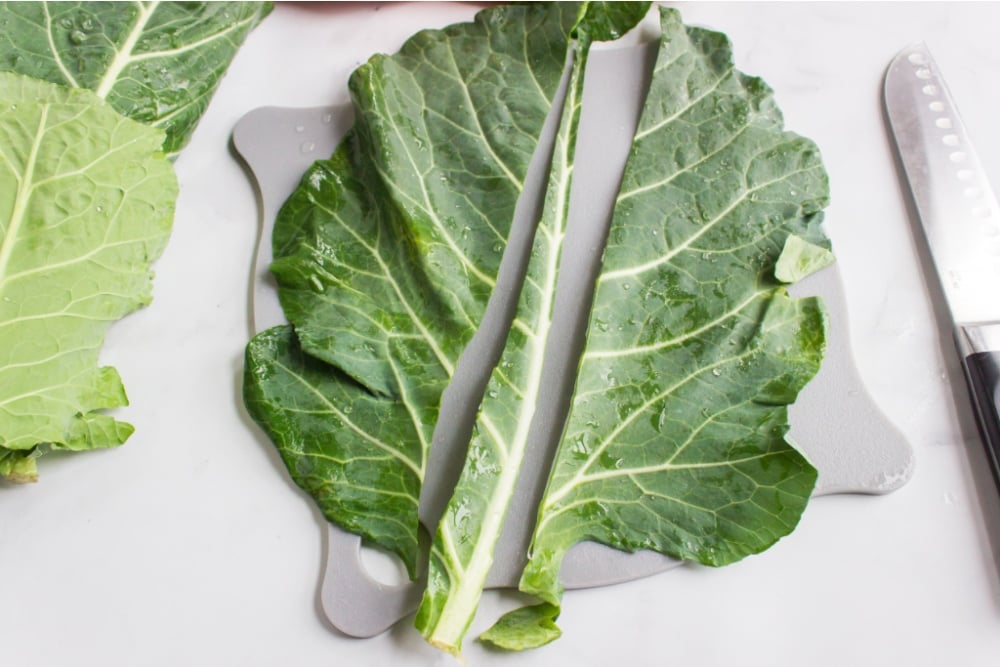 showing the middle stem being cut our from collard