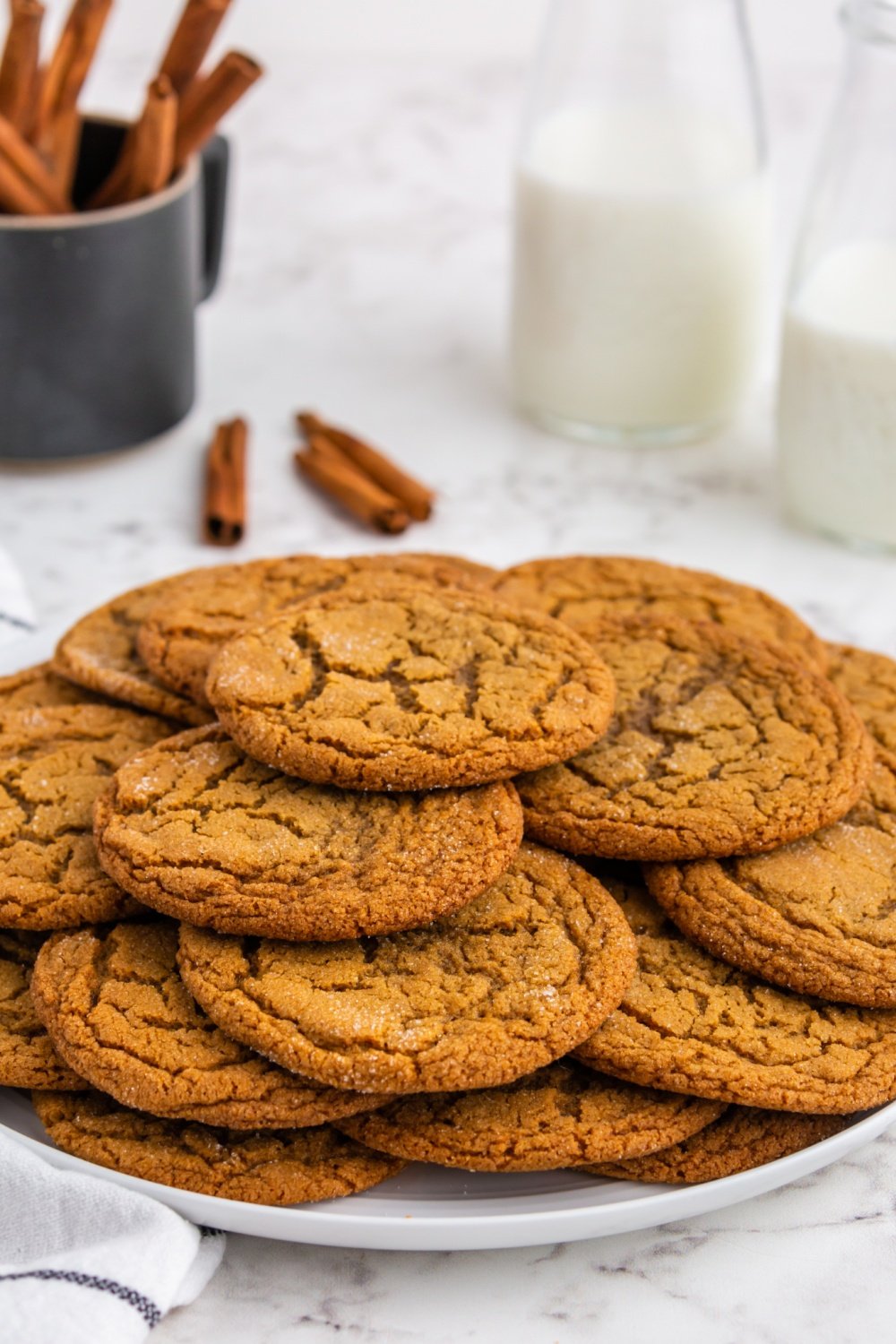 Chewy Gingersnap Cookies stacked on a plate