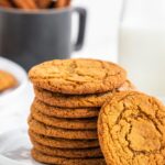 Chewy Gingersnap Cookies stacked on a plate