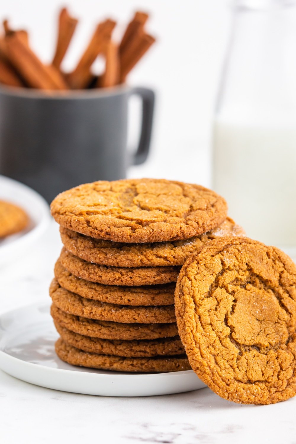 Chewy Gingersnap Cookies stacked on a plate