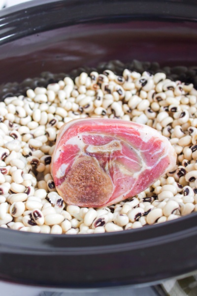 ham hock and black eye peas in a slow cooker