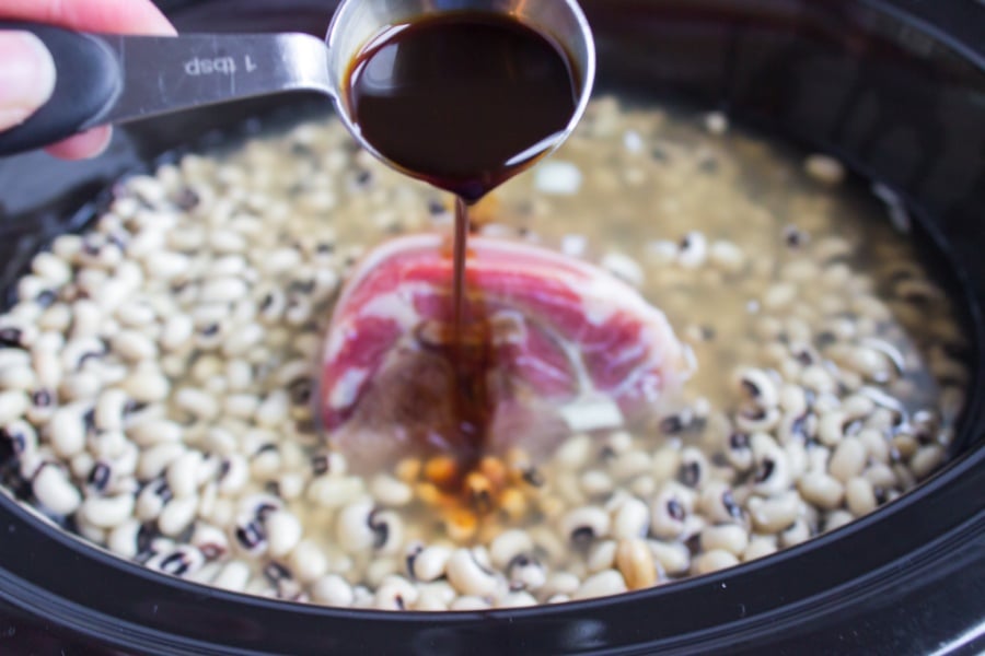 pouring Worcestershire into slow cooker
