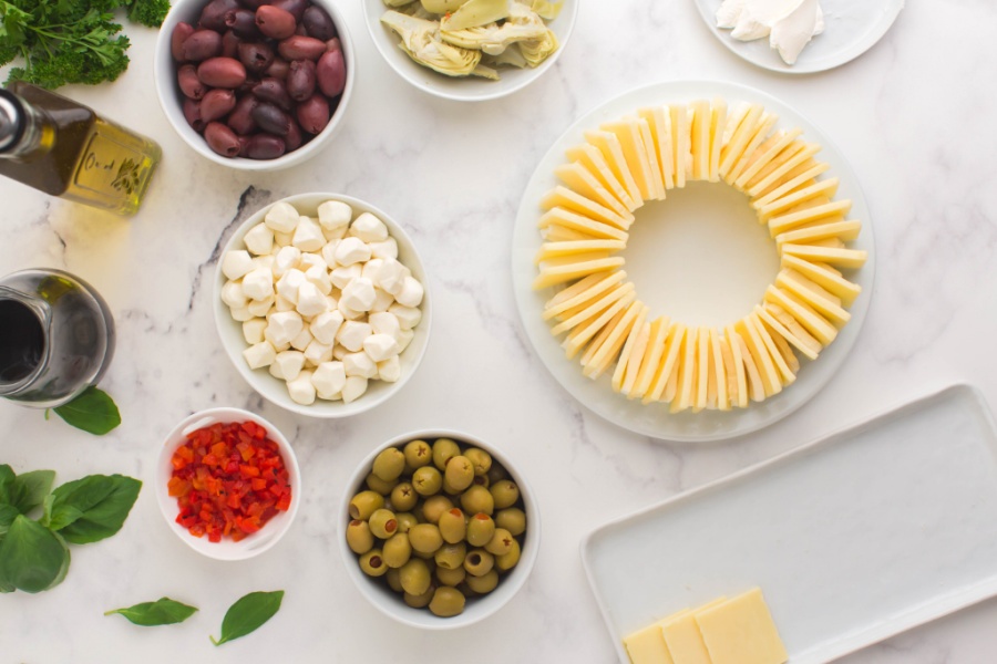 showing cheese sliced stacked together in a shape of a ring