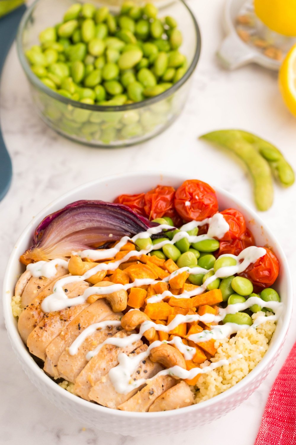 Chicken Buddha Bowl drizzled with a white sauce