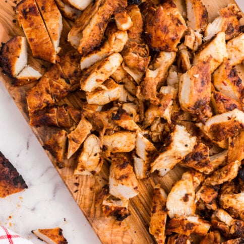 Chipotle Chicken cut up on a cutting board