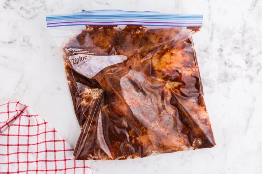 chicken and marinade in a large ziplock bag