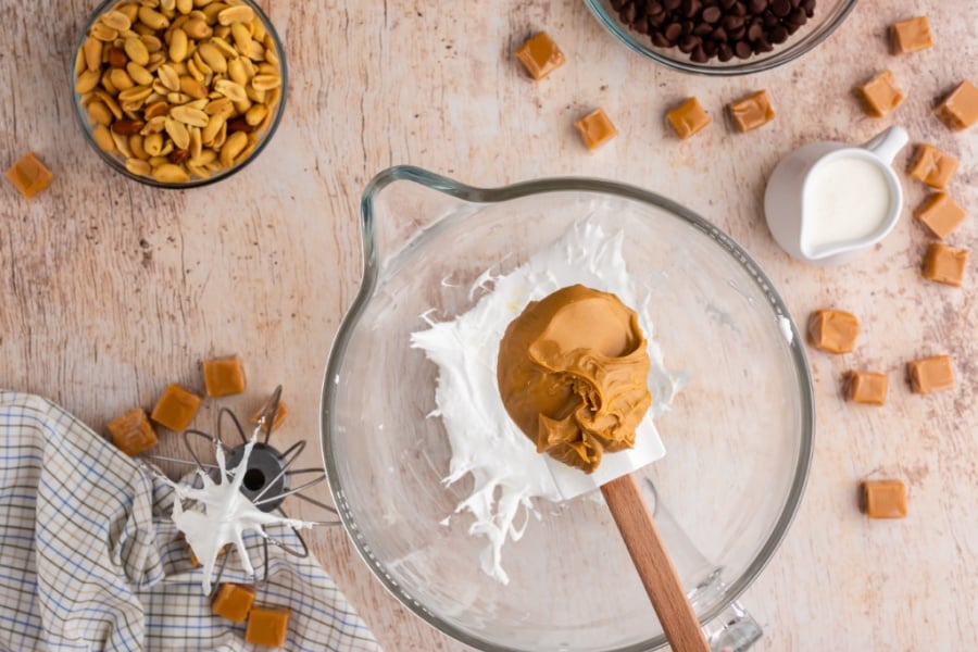 mixing peanut butter in to foam mixture