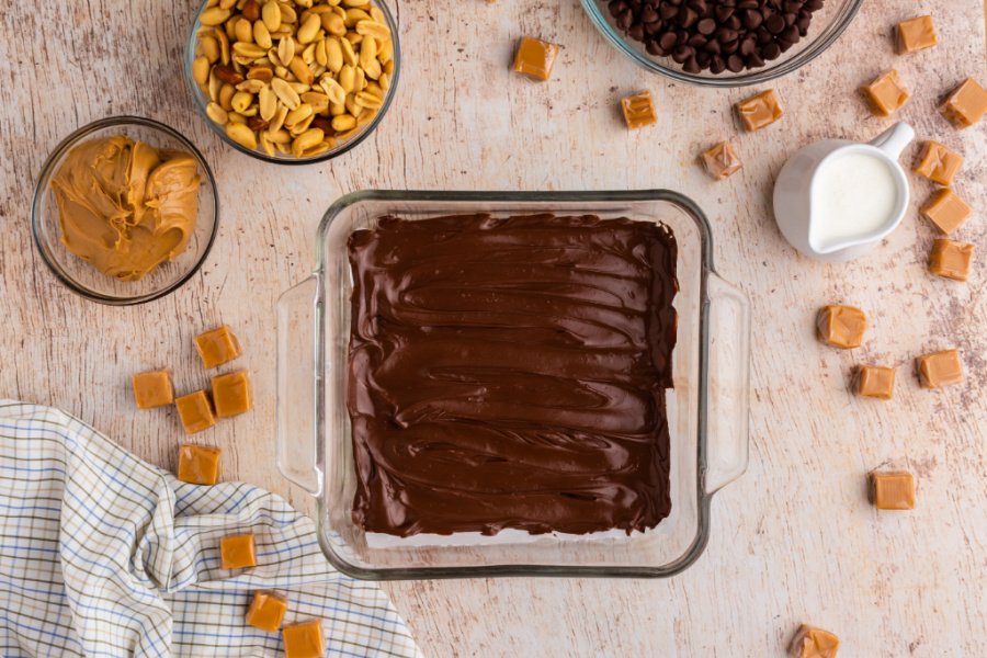 melted chocolate spread out in baking dish