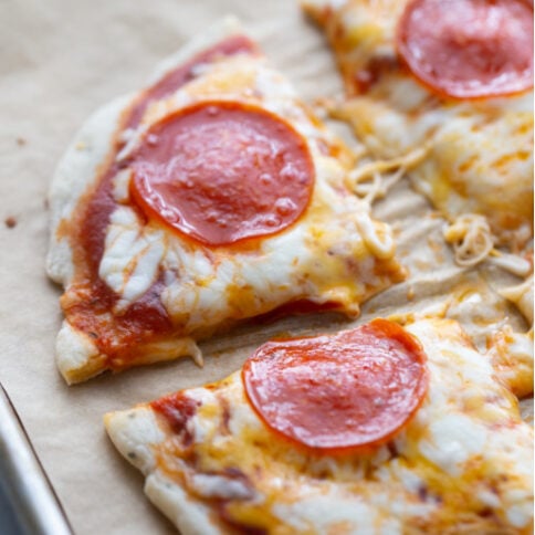 small pepperoni pizza cut into fourths