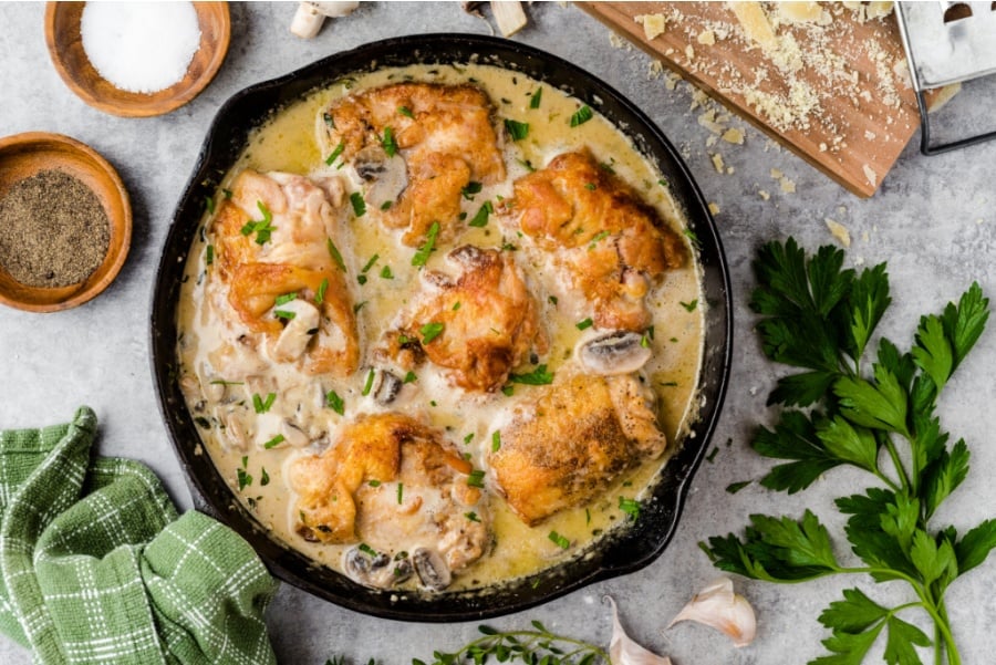 Creamy Mushroom Chicken Thighs in a cast iron skillet