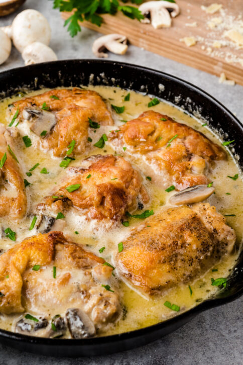 Creamy Mushroom Chicken Thighs in a cast iron pan