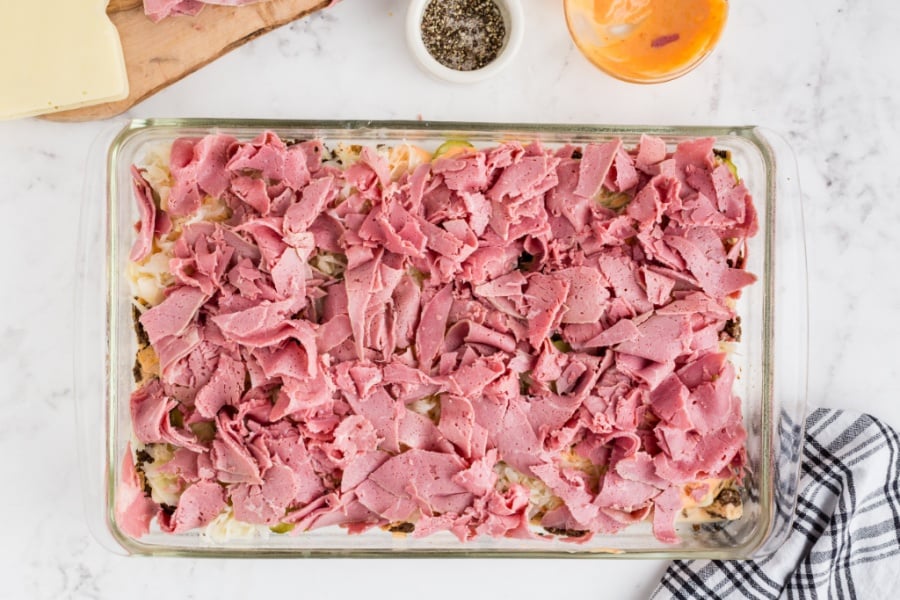 shopped corned beef spread on top of sauerkraut 
