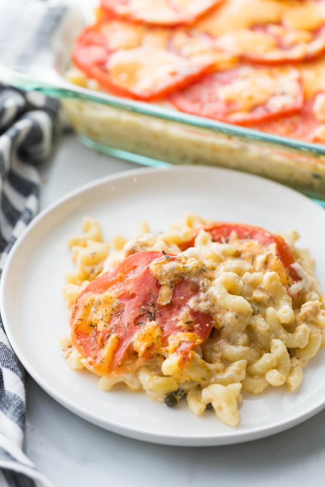 This Creamy Tuna Melt Casserole is layered with tomato slices, cheese, and a sprinkle of dried dill, and baked until golden. via @familyfresh