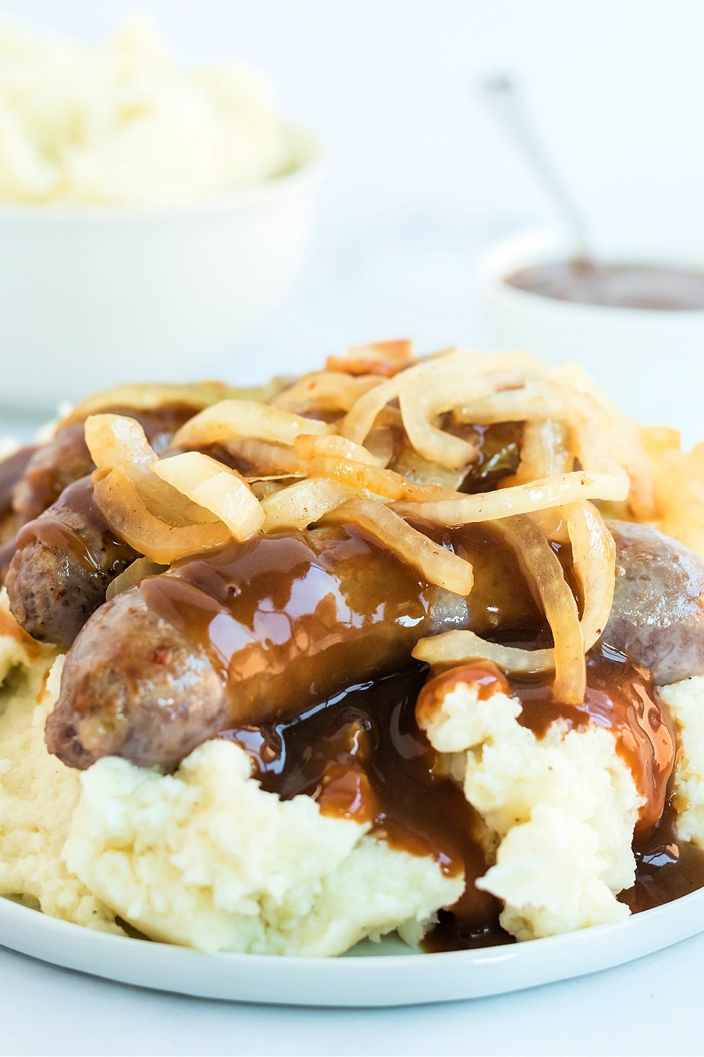 serving of bangers and mash on a plate