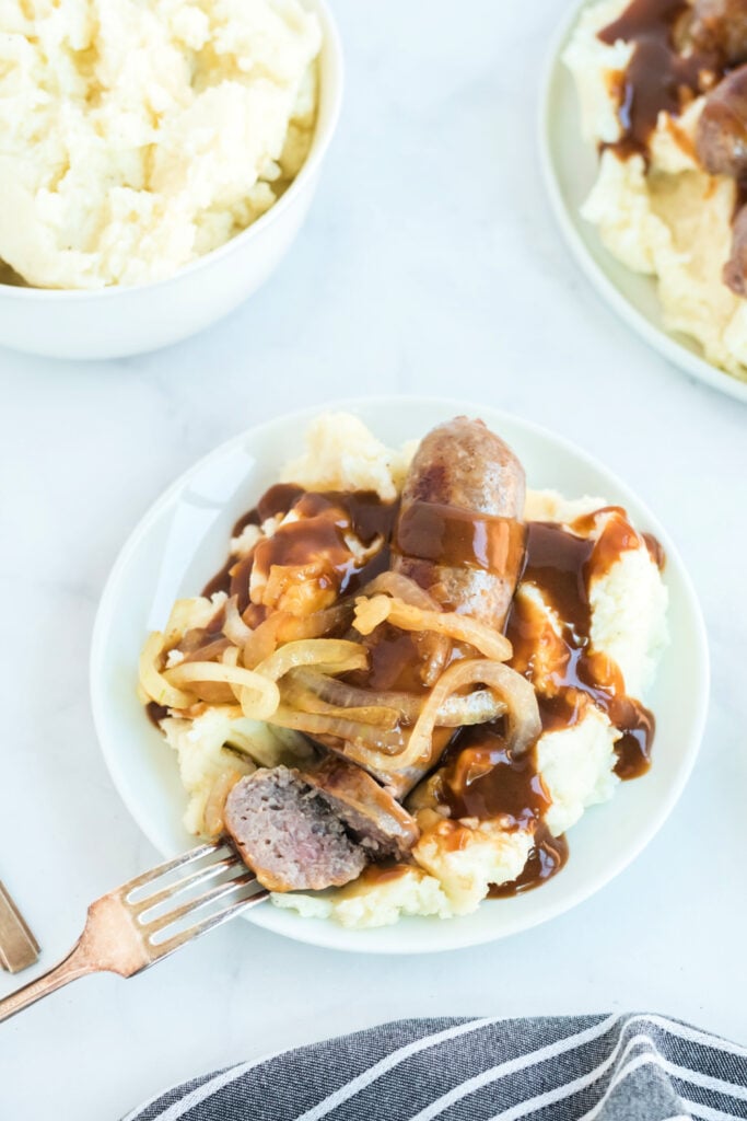 serving of bangers and mash on a plate