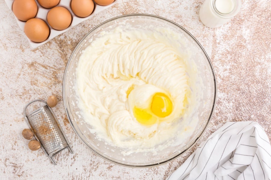 eggs being added to cake batter