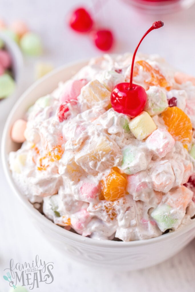 Ambrosia Salad in a white serving bowl