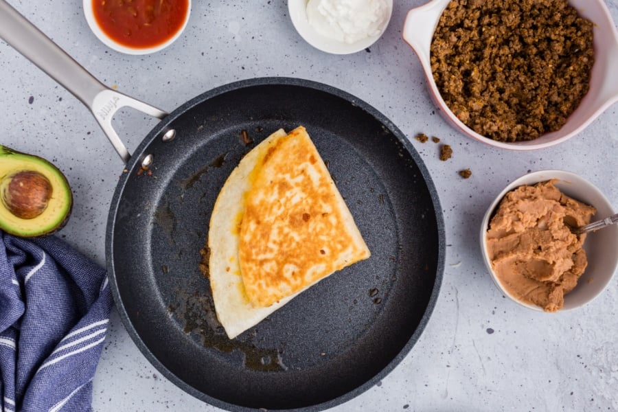 cooked quesadilla in a frying pan