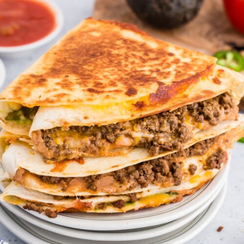 stack of quesadillas on plates