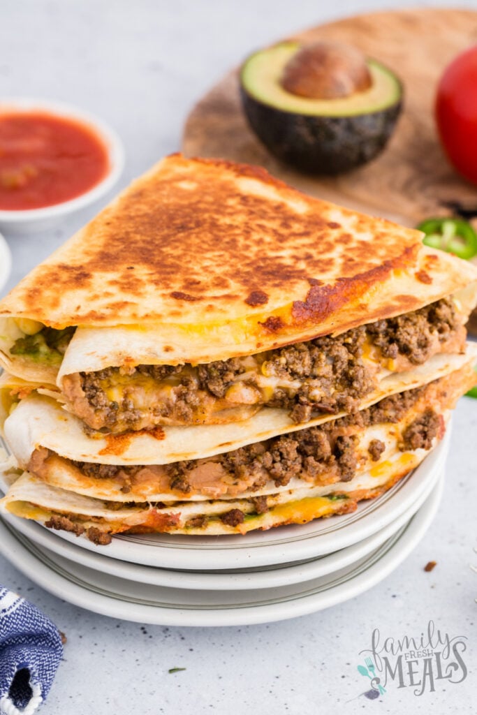 stack of quesadillas on plates