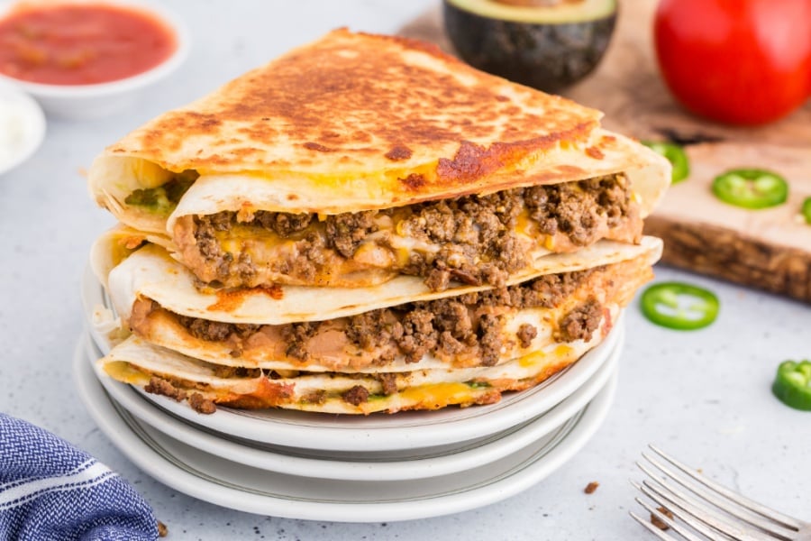 stack of quesadillas on plates