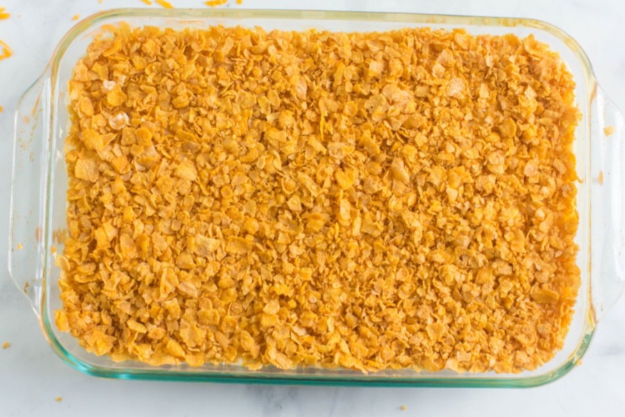 Classic Cheesy Funeral Potatoes in a glass baking dish