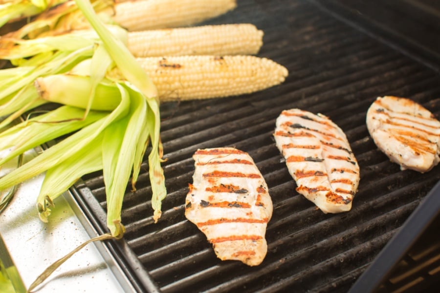 chicken and corn on a bbq grill