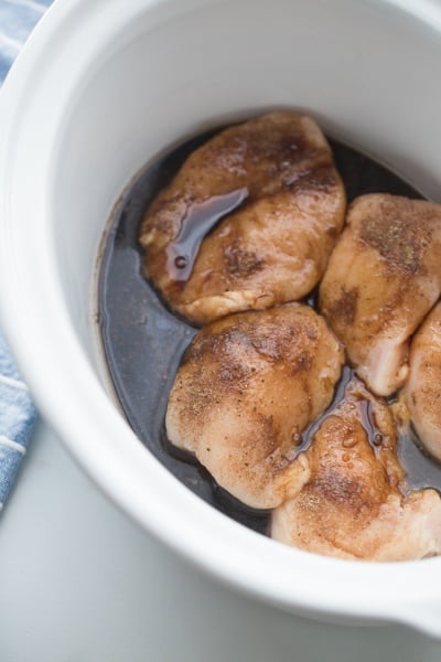 chicken and sauce in a crockpot