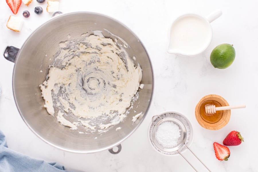 cream cheese whipped in a mixing bowl