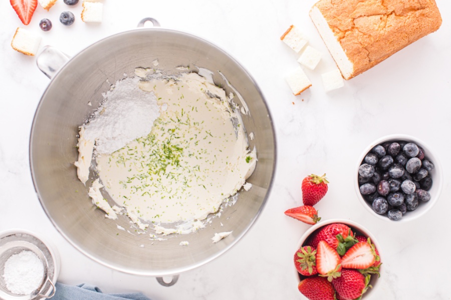 heavy cream, powdered sugar, honey, lime juice, and lime zest added to the mixing bowl