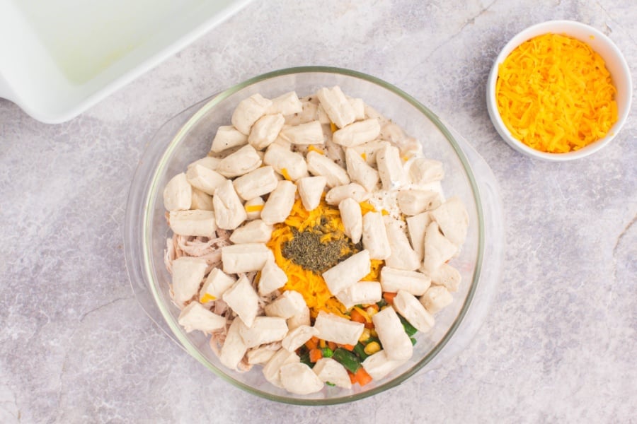 ingredients for bubble up casserole in a mixing bowl