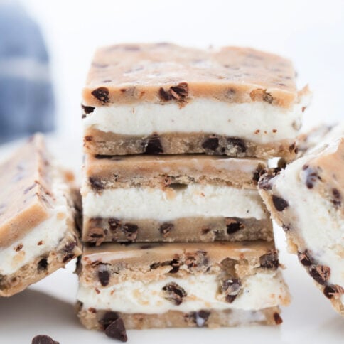 Cookie Dough Ice Cream Sandwiches stacked on a plate