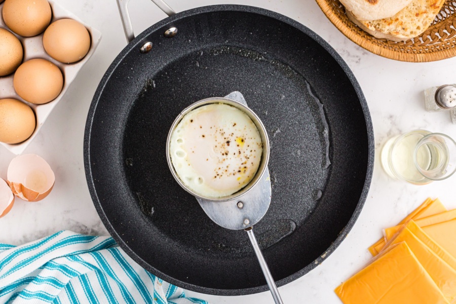 picking egg up with spatula 