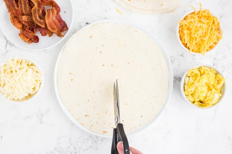 kitchen scissors cutting tortilla