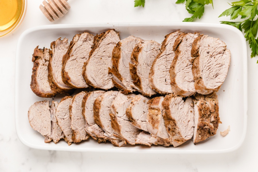 sliced pork on a serving platter