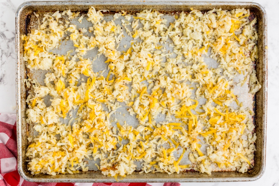 cheese sprinkled over hasbrowns
