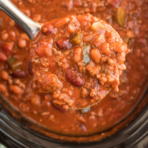 A ladle scooping up some Crockpot Chili Con Carne