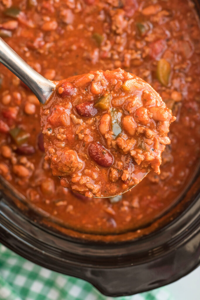 A ladle scooping up some Crockpot Chili Con Carne