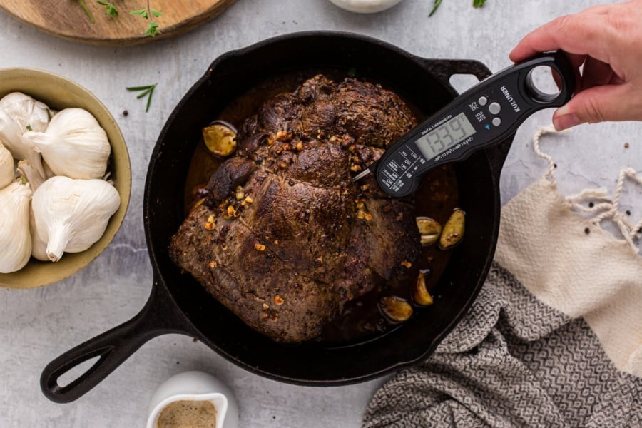 meat thermometer placed in meat