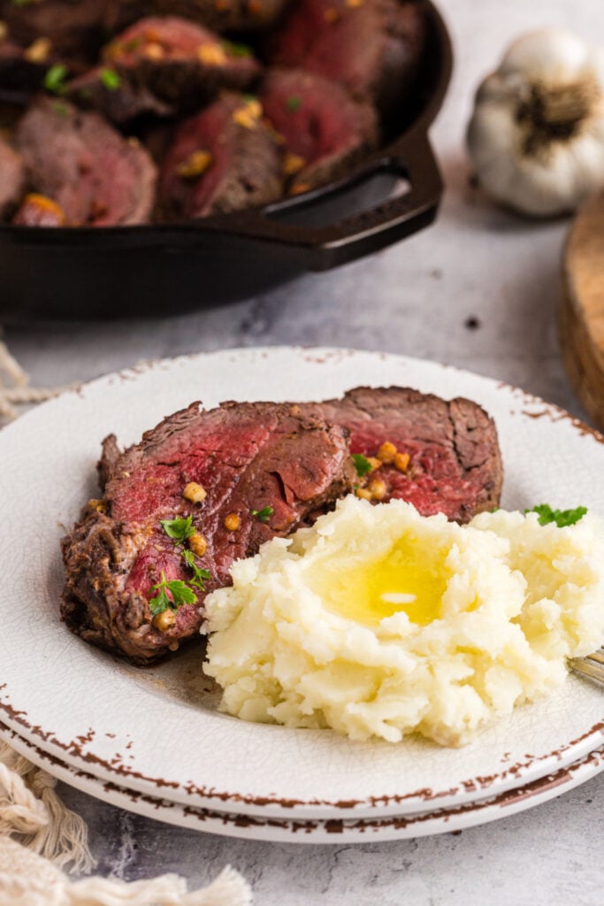 Garlic Roasted Beef Tenderloin served with mashed potatoes