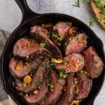 Garlic Roasted Beef Tenderloin Recipe in a cast iron pan