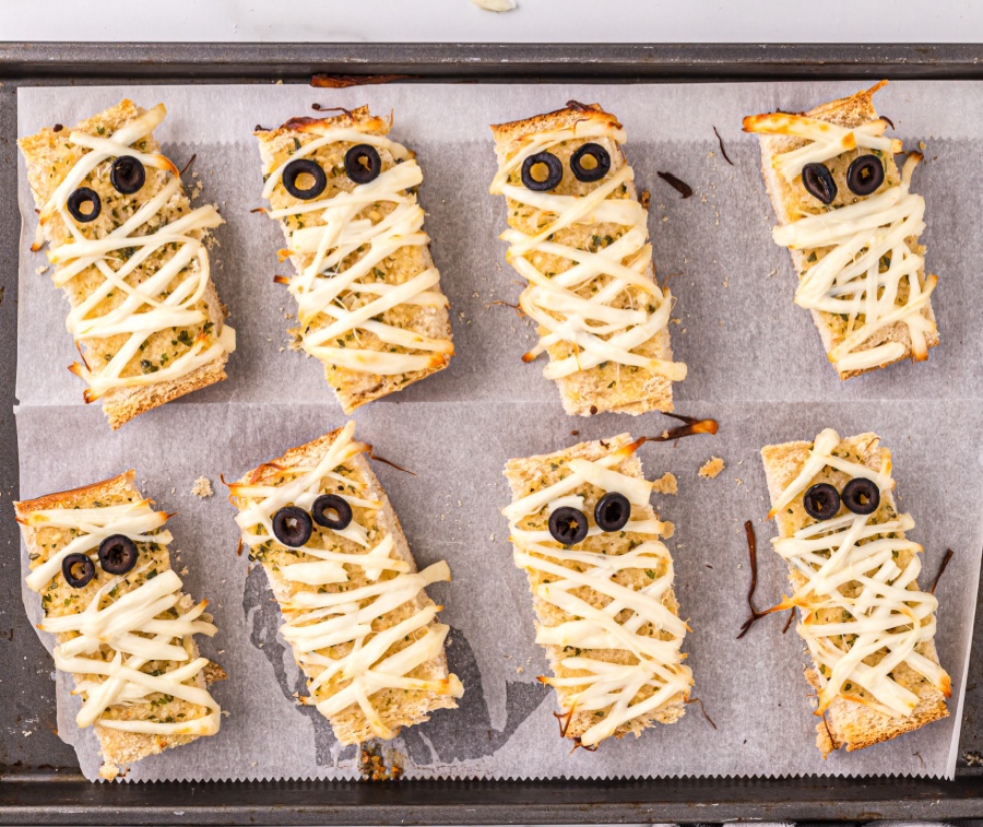 mummy garlic bread on baking pan