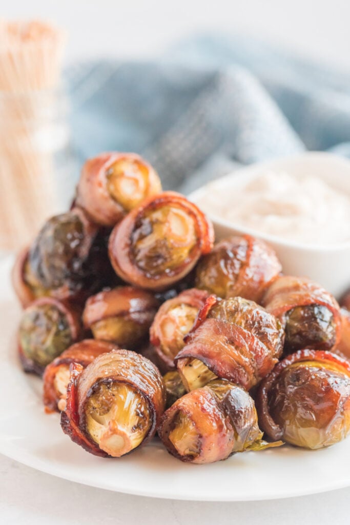 Bacon Wrapped Brussels Sprouts on a serving plate