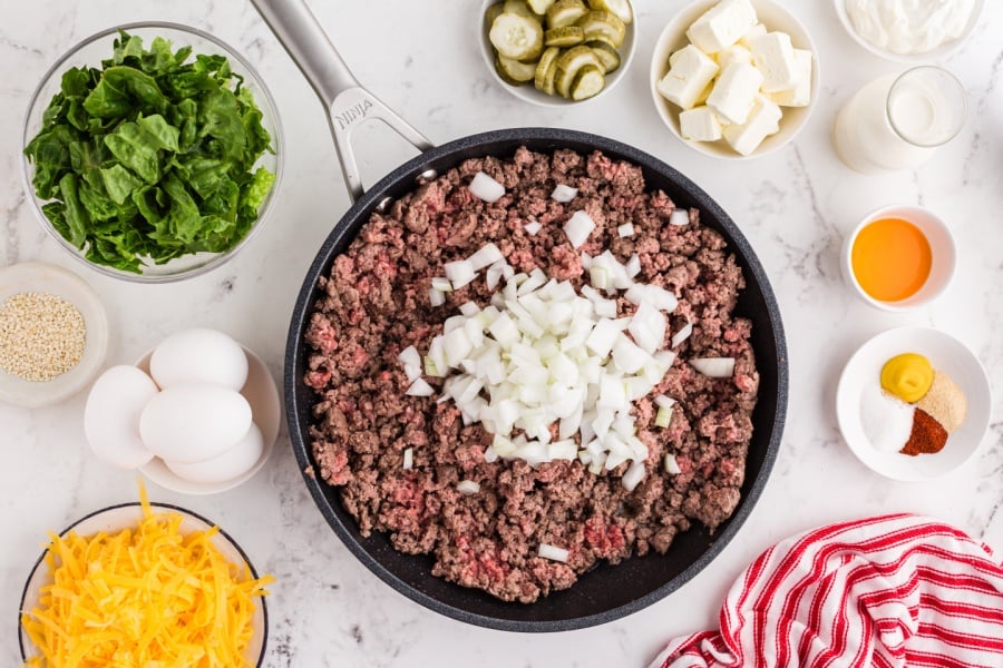 ground beef and onion in pan