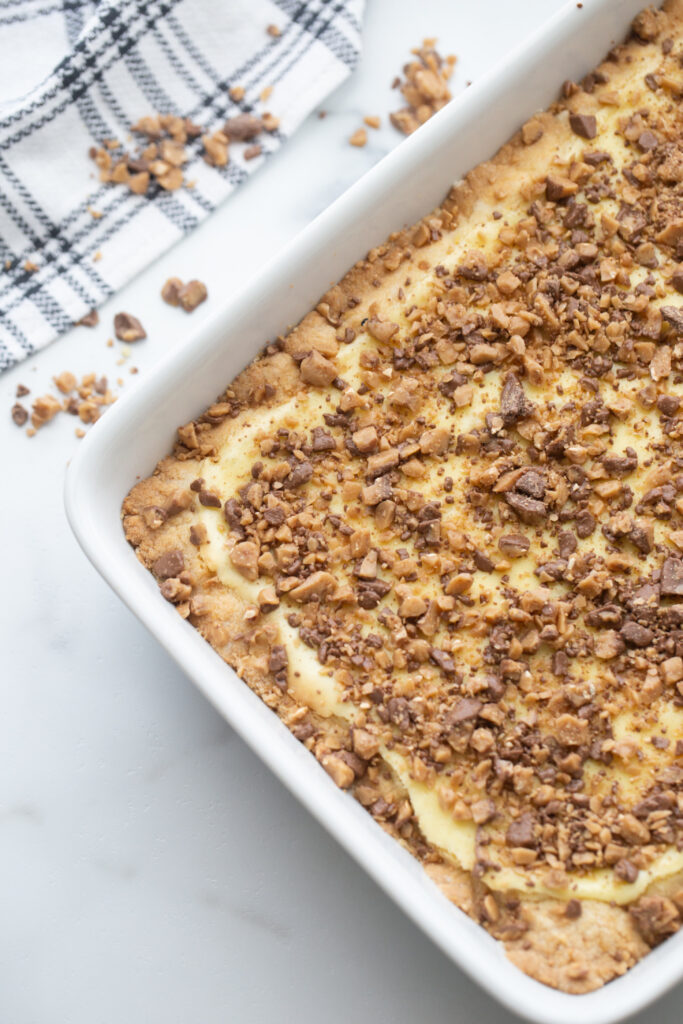 toffee bits added to top of cheesecake mixture