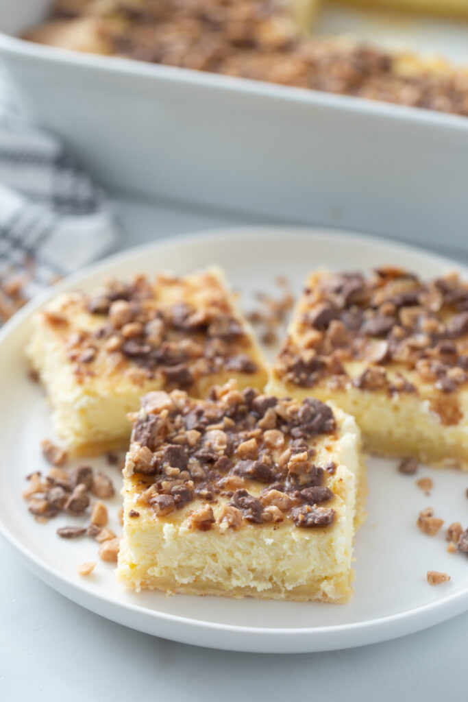 Toffee Crunch Cheesecake Bars on a plate