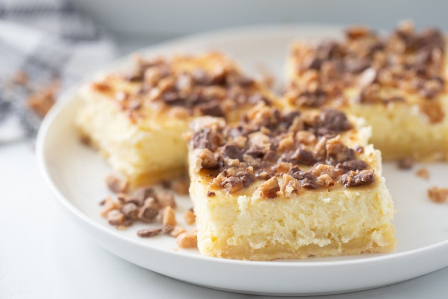 Toffee Crunch Cheesecake Bars on a plate