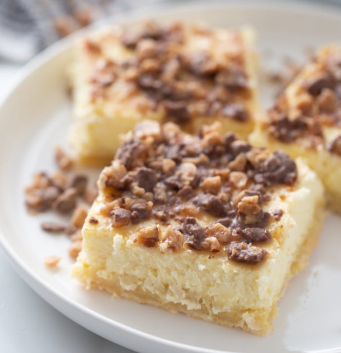 Toffee Crunch Cheesecake Bars on a plate