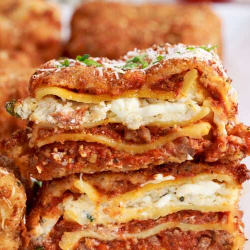 Deep Fried Lasagna pieces stacked on a plate